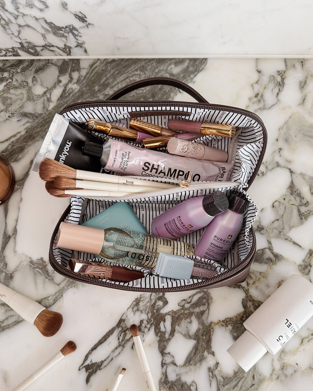 Open chocolate Louenhide Ellis makeup bag