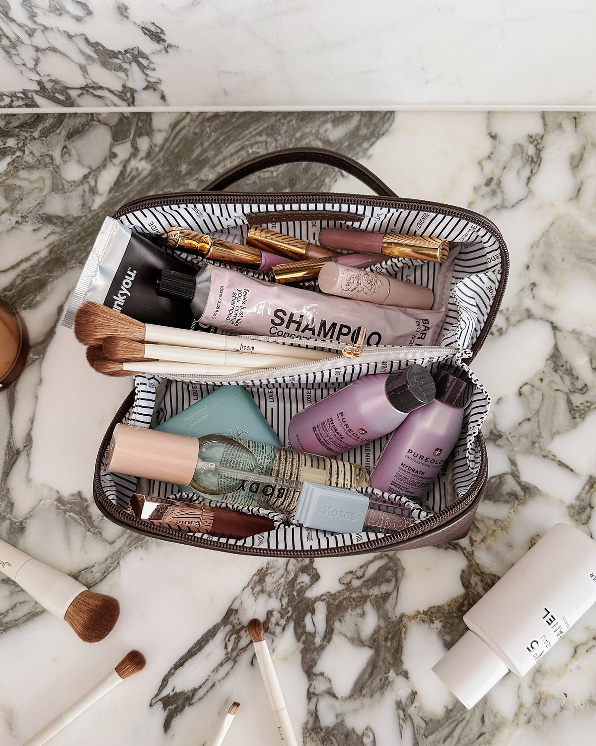 Open chocolate Louenhide Ellis makeup bag